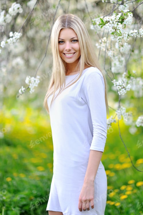 Preview: Beautiful Smiling Woman Portrait In A Garden