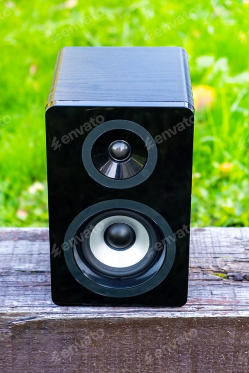 Preview: Loud Speaker Box On The Bench And Grass Background