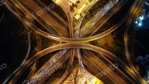 Preview: Aerial Drone Slow Shutter Night Shot Of Urban Elevated Toll Ring Road Junction And Interchange