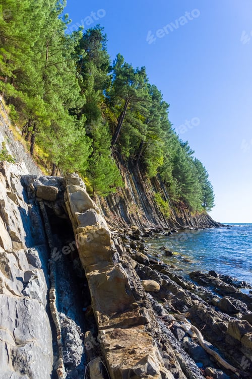 Preview: Rocky Sea Shore With Pebble Beach, Waves With Foam
