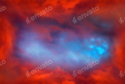 Preview: Blurred Swirl In The Red Clouds With A Light
