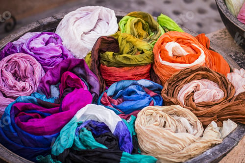 Preview: Colored Silk Scarves Twisted Into Tubes For Sale