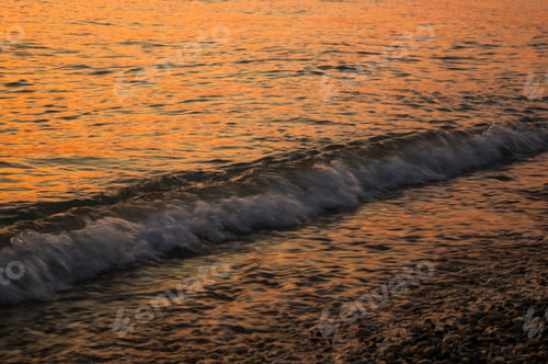 Preview: Amazing Sea Sunset On The Pebble Beach, The Sun, Waves, Clouds