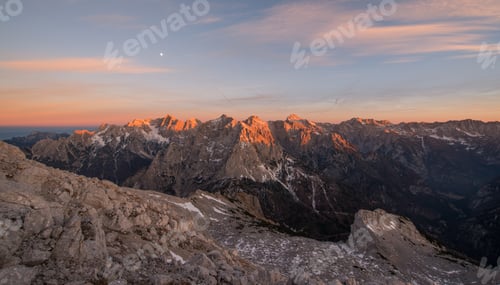 Preview: Sunset In The Mountains With Hikers Resting At The Top