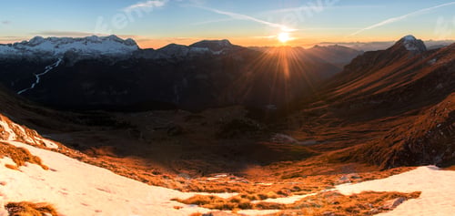 Preview: Sunset In The Mountains Above Pecol Meadow In Italy Above Mountain Pass Sella Nevea.