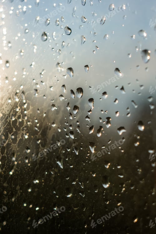 Preview: Raindrops On Window Glass On Background Of Cloudy Sky