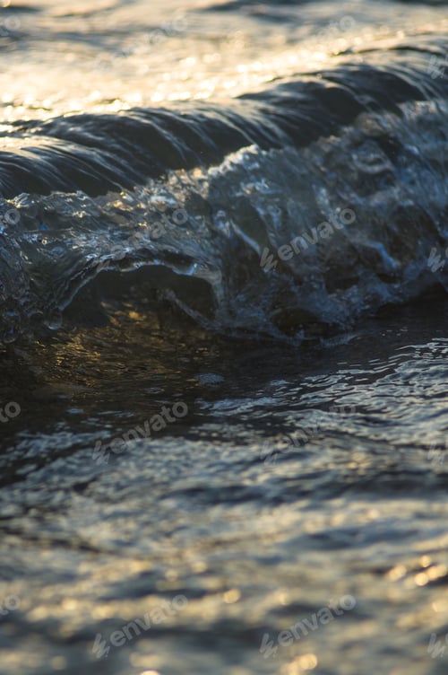 Preview: Pebble Stones On The Sea Beach, The Rolling Waves Of The Sea With Foam