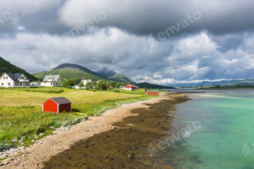 Preview: Red House Standing In The Beautiful Landscape With Colorful Azure Water In The Fjord Of Lofoten