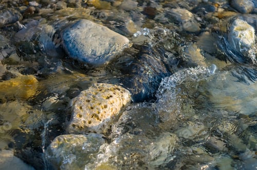 Preview: Pebble Stones On The Sea Beach, The Rolling Waves Of The Sea With Foam