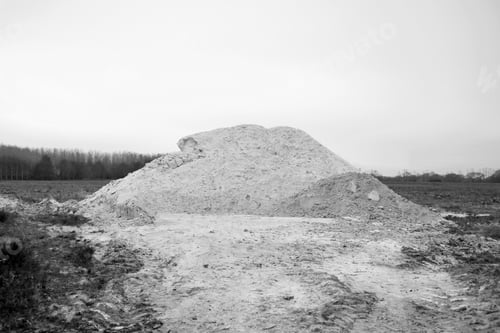 Preview: A Pile Of White Fertilizer Powder In A Farm Field