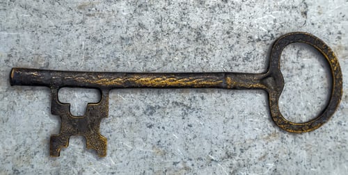 Preview: Bronze Key Old On Marble Background Stone Surface