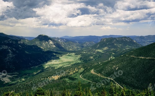 Preview: Snowy Clouds Over A Mountain Valley In The Rocky Mountains. Rocky Mountain National Park