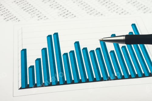 Preview: Businessman Showing A Diagram On A Financial Report Using A Pen