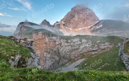 Preview: Foggy Sunset At The Mangart Saddle Mountain In Slovenia.