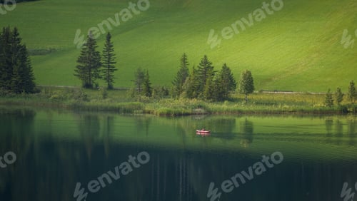 Preview: Lake Weissensee Reflection Of Cottages And Trees