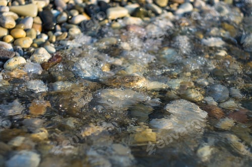 Preview: Pebble Stones On The Sea Beach, The Rolling Waves Of The Sea With Foam