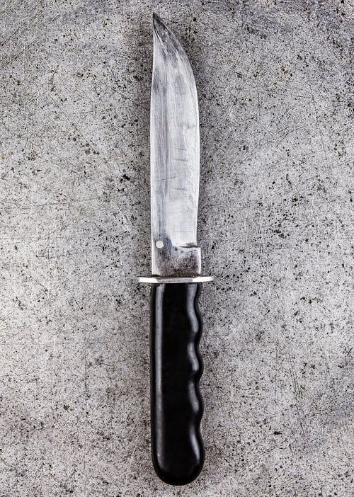 Preview: Knife On The Grunge Metal Background Closeup