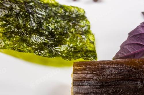 Preview: Smoked Garfish With Lime, Basil, Green Onions, Chili, Nori Chips, Spices, Olive Oil In A White