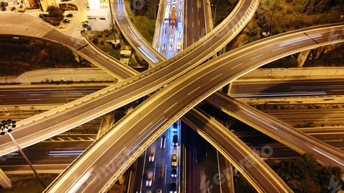 Preview: Aerial Drone Slow Shutter Night Shot Of Urban Elevated Toll Road Junction And Interchange Overpass