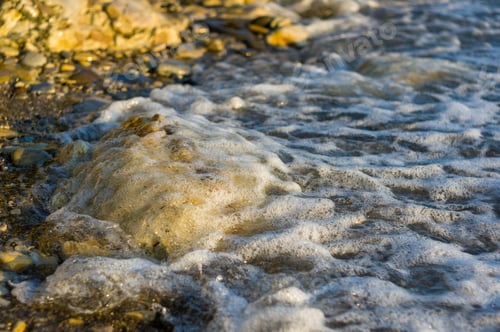 Preview: Pebble Stones On The Sea Beach, The Rolling Waves Of The Sea With Foam