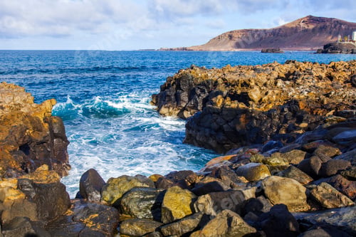 Preview: Picturesque Surf At The Coast Of The Atlantic Ocean In Cloudy Weather