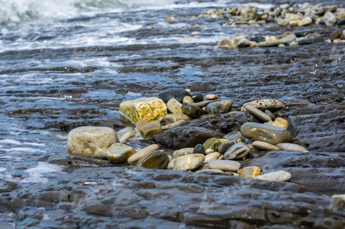 Preview: Pebble Stones On The Sea Beach, The Rolling Waves Of The Sea With Foam