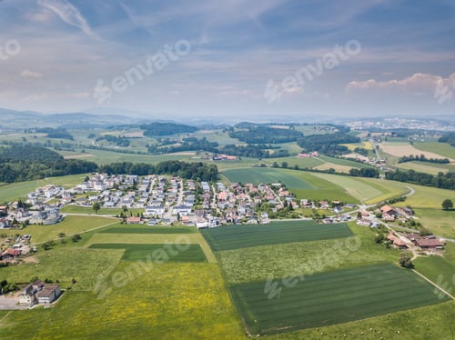 Preview: Aerial View Of Rural Village In Switzerland With Building And Ro
