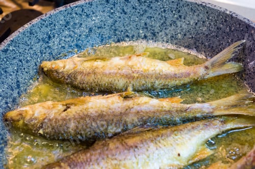 Preview: Fried River Fish With Crispy Crust In A Frying Pan, Homemade Dish, Close Up