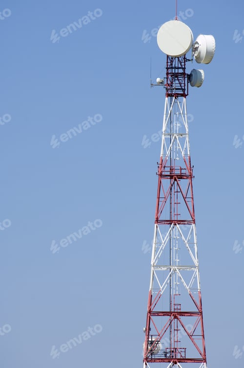 Preview: Telecommunications Tower, Painted White And Red In A Day Of Clear Blue Sky