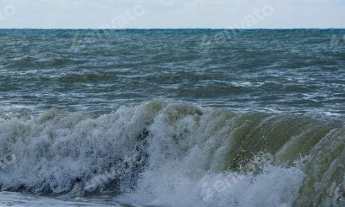 Preview: Sea Landscape Is A Pebbly Beach With Waves In White Foam