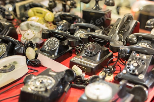 Preview: Set Of Antique Telephones On A Table: Vintage Objects.