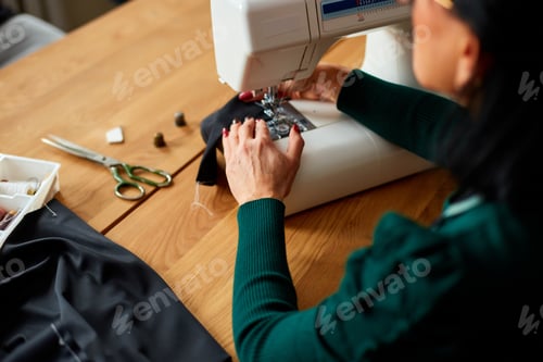 Preview: Step By Step, 50-Yers Old Woman Sews Clothes On Sewing Machine, Mature Tailor Working With Sewing