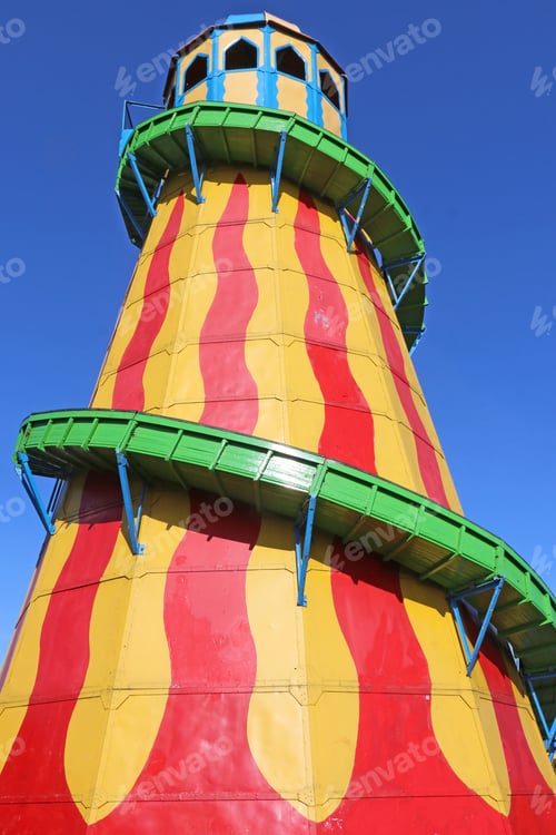 Preview: Vintage Red Yellow And Green Helter Skelter In A Fairground