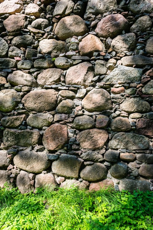 Preview: Ancient Stone Brick Wall Background Texture With Green Grass