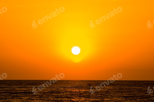Preview: Amazing Sea Sunset On The Pebble Beach, The Sun, Waves, Clouds