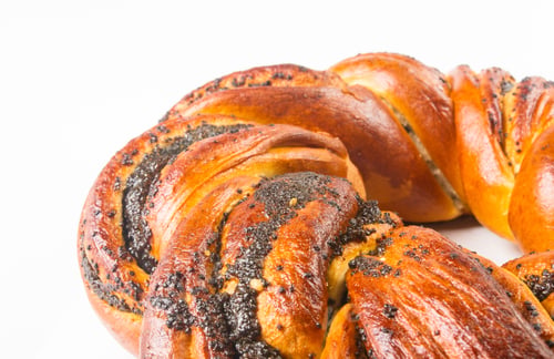 Preview: Braided Poppy Seed Round Loaf On White Background