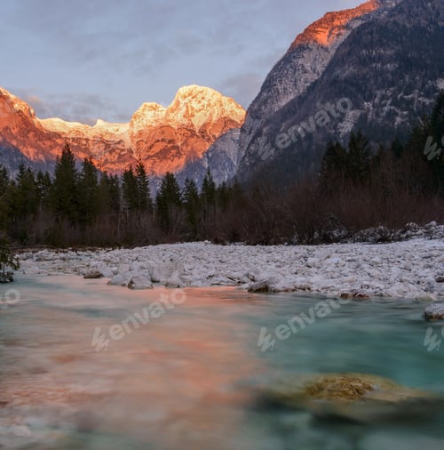 Preview: Sunset At The Soca River With Snowy Mountains In The Background