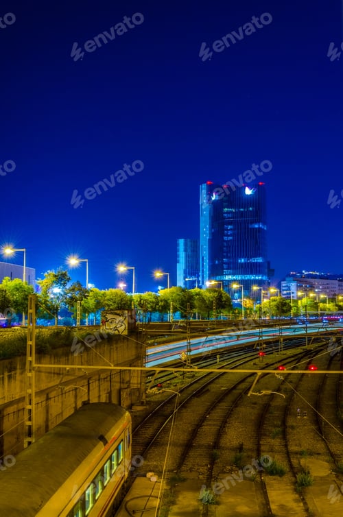 Preview: View Of A Rail Track With A Skyscraper At Background In Barcelona