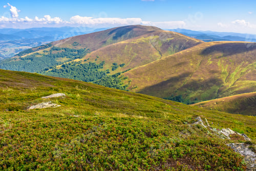 Preview: Summer Landscape With Meadow On Hillside And Mountain Range In A Distance