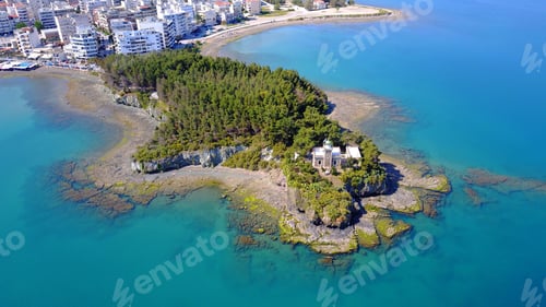 Preview: Aerial Birds Eye View Photo Taken By Drone Of Small Island With Lighthouse And Rocky Seascape