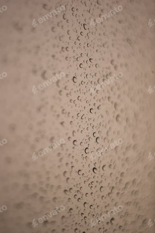 Preview: Raindrops On Window Glass On Background Of Cloudy Sky