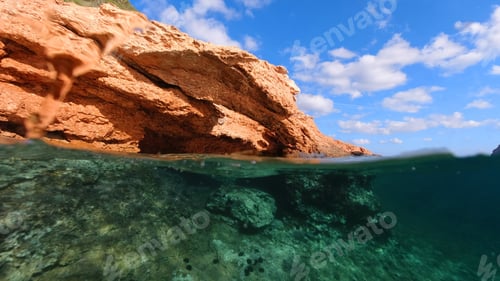 Preview: Above And Below Underwater Photo Of Tropical Exotic Island Arch Cave With Emerald Sea And Deep Blue