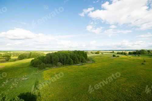 Preview: Beautiful Green Fields Under Blue Sky In Summer With White Clouds And Perspective
