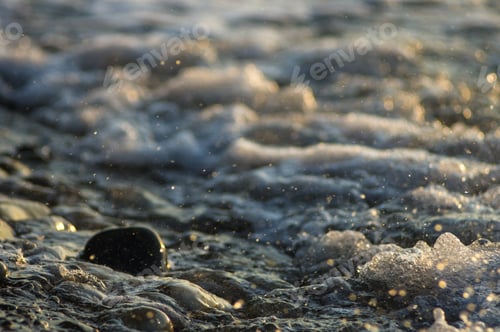 Preview: Pebble Stones On The Sea Beach, The Rolling Waves Of The Sea With Foam