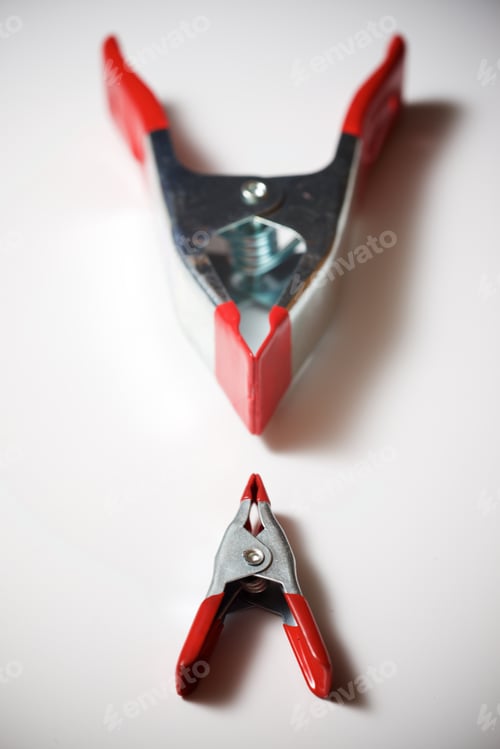 Preview: Clamps On A White Table