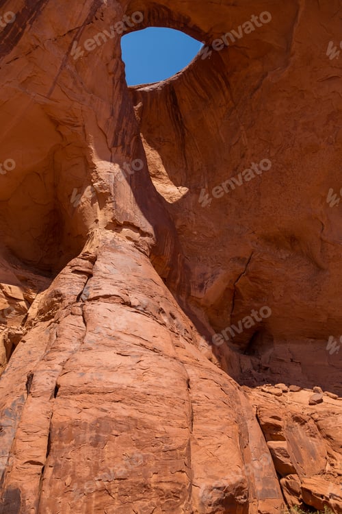 Preview: Suns Eye. Pothole Natural Arch Eroded In Sandstone. Navajo Tribal Park Of Monument Valley, Arizona
