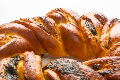 Preview: Braided Poppy Seed Round Loaf On White Background