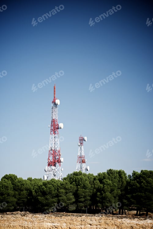 Preview: Telecommunications Towers With Clear Blue Sky.