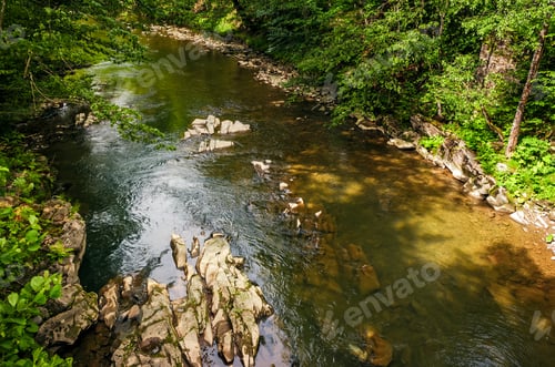 Preview: River With Rocky Shore In The Forest. View From Above. Beautiful Nature Background With Lots Of