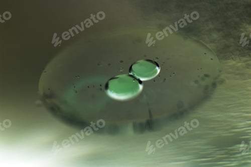Preview: Abstract Composition Of Oil Drops On A Water Surface With Very Soft Focus